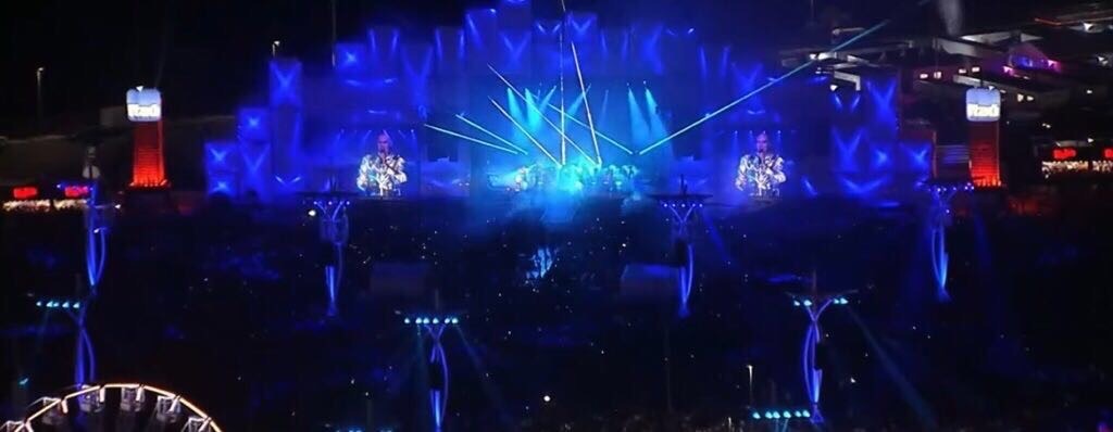 Huge crowd in front of a bright lit stage at a Pet Shop Boys concert produced by 1314