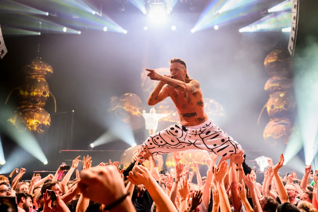 Watkin Tudor Jonesdoing a crowd surf on one of Die Antwoords concerts produced by 1314