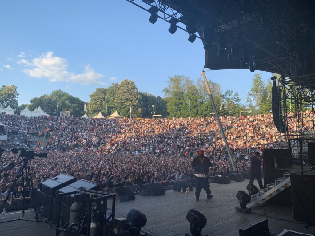 Crowd in front of a stage at a concert produced by 1314